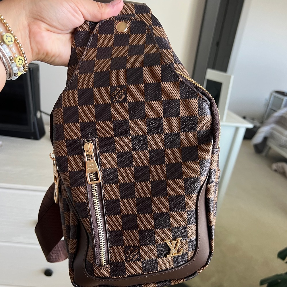 FAKE LV cross body never used